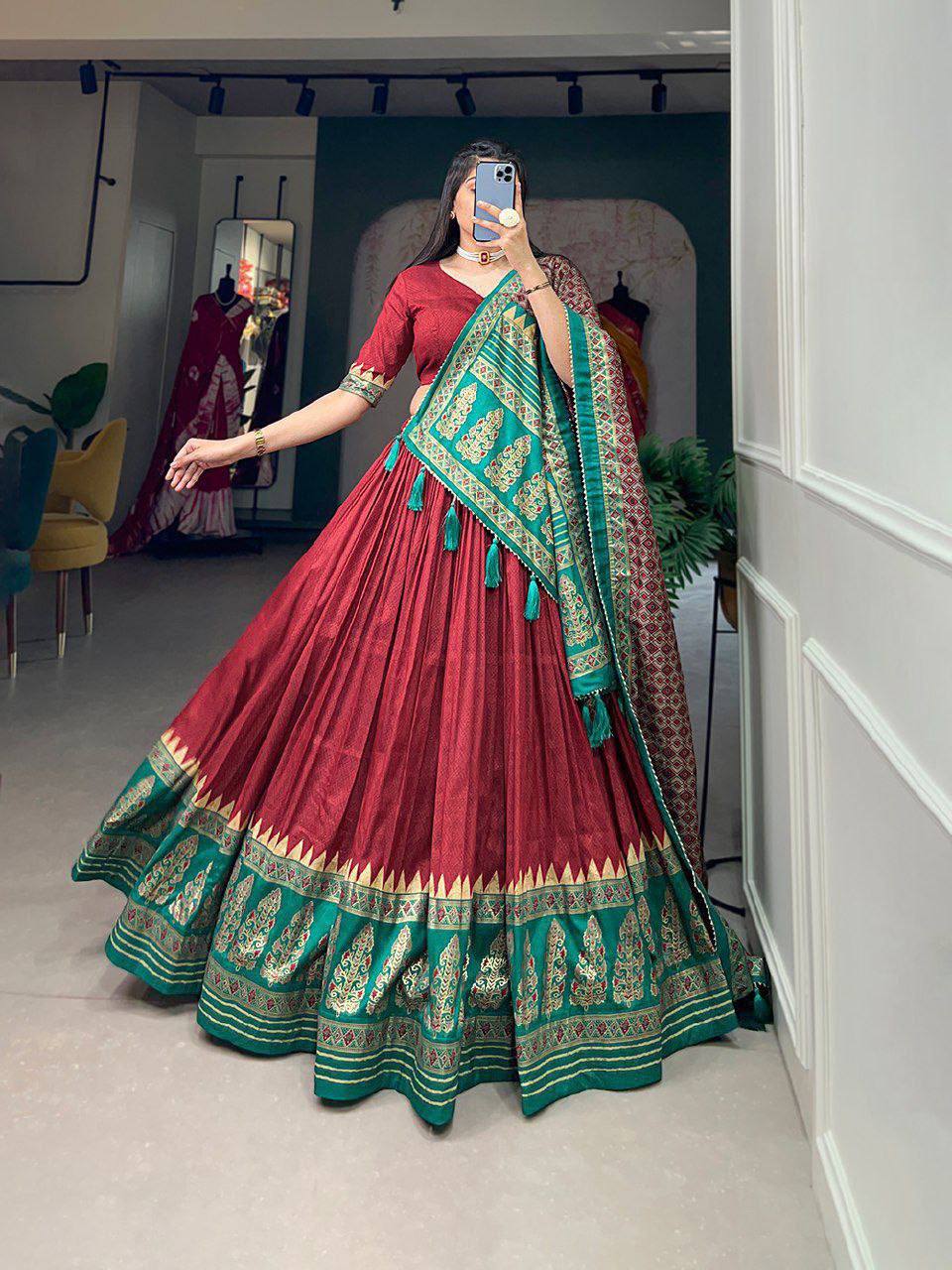 Step into luxury with this exquisite Tussar Silk Lehenga Set, beautifully adorned with Ikkat Patola prints and shimmering foil work.
